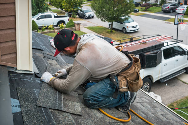Professional Emergency Roof Repair technician working in Munson, PA